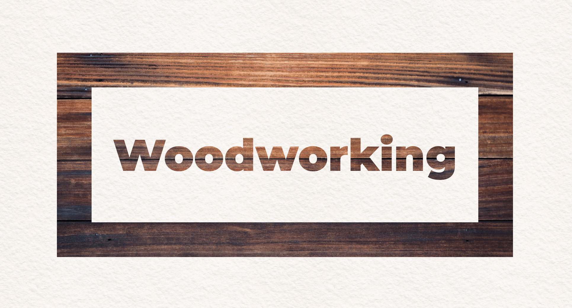 The word "woodworking" large on the page, inside a box with a very thick border. Both the text and border are made out of a photo of a wooden board, showing its wood grain.